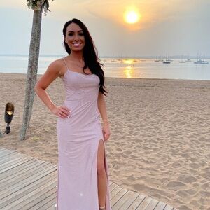 La femme rhinestone beaded Jersey gown.